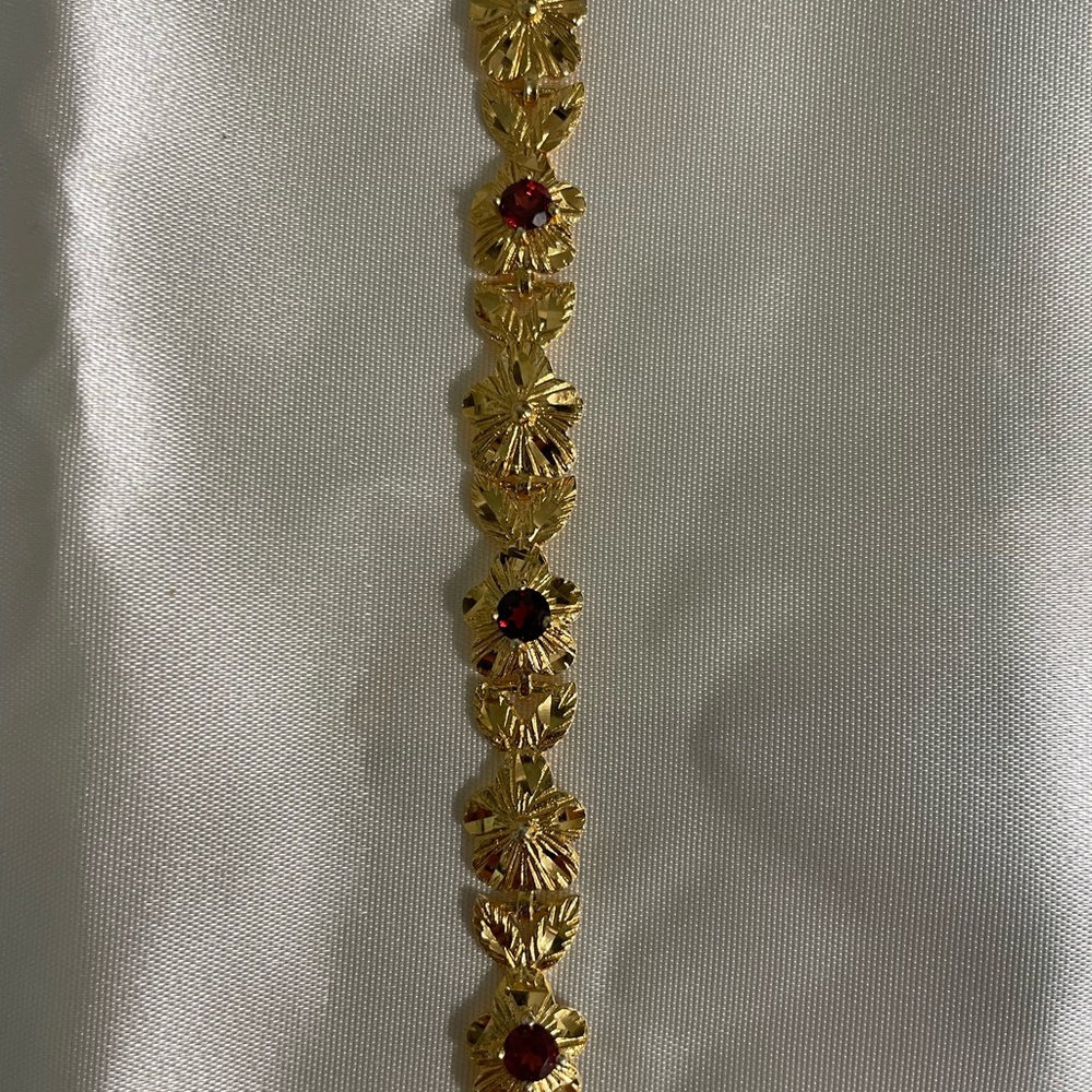 Gold Bracelet with Red Accents